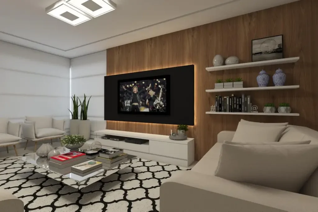 Como montar uma sala planejada? Planejamento vai muito além dos móveis O planejamento da sala de estar envolve muitos outros elementos além dos móveis planejados. Por isso, a dica aqui é: antes de qualquer coisa tenha em mãos as medidas exatas do espaço, se for precise trace no papel o desenho do ambiente, lembrando de incluir janelas e portas. Com essa planta baixa da sala avalie o espaço real que você tem disponível, a quantidade de luz natural que o ambiente recebe e, principalmente, qual será a finalidade de uso da sala de estar. Todos esses itens influenciam no planejamento do espaço. Para salas de estar com foco em receber visitas, aposte em assentos em quantidades suficientes para acomodar a todos com conforto. Já se o uso principal da sala de estar for assistir TV é importante contar com um sofá confortável, de preferência os modelos com opção reclinável e retrátil. Vale ainda apostar em uma cortina de tecido blackout para impedir que a luz natural atrapalhe as sessões de cinema. E por falar em luz, lembre-se de considerar um bom projeto de iluminação para a sala de estar planejada, independente do uso que será feito dela. Tenha uma luz branca principal e direta, mas conte também com a ajuda de spots, fitas de LED e luminárias para criar uma iluminação indireta e aconchegante, preferencialmente com lâmpadas amareladas. Tapetes, cortinas, plantas, quadros e outros objetos decorativos também devem integrar o planejamento da sala, levando em consideração o tamanho do ambiente, o conforto e a beleza que se pretende alcançar. Acerte na paleta de cores Definir a paleta de cores da sala de estar planejada é o próximo passo mega importante da lista. A paleta de cores será usada para definir as cores que irão para as paredes, os móveis, cortinas e tapetes. Se a sala de estar for pequena, o mais interessante é apostar em tons claros e neutros que ampliam a sensação de espaço e reforçam a luminosidade. Os tons mais escuros ou vibrantes podem ser usados em salas pequenas, mas não como cor principal, já as salas maiores trazem uma liberdade maior no uso das cores, contudo, também é importante contar com o bom senso para não sobrecarregar o espaço. Defina o estilo da decoração O estilo de decoração da sala planejada vai te mostrar qual direção seguir. É comum olhar para diferentes estilos e gostar de todos e, na hora de escolher a mobília e demais objetos da sala se sentir completamente perdido. O resultado disso pode ser uma verdadeira bagunça visual na sala. Para não correr esse risco, busque pelas referências que mais te agradam, como o escandinavo e industrial, por exemplo, e comece a planejar a sala dentro desses conceitos. Mobília sob medida Agora sim, vamos falar sobre os móveis planejados para a sala de estar. Eles são a cereja do bolo e fazem toda a diferença no ambiente, especialmente em salas planejadas pequenas. Você não precisa de muitos móveis para garantir o conforto e a funcionalidade da sala, geralmente apenas um sofá, painel com rack para TV, uma mesa de centro ou lateral e talvez alguns nichos e prateleiras. Poltronas, puffs e cadeiras também podem aparecer no projeto, mas não são itens obrigatórios. Mas você deve estar se perguntando: devo mesmo investir em móveis planejados? Tudo vai depender do seu orçamento, é claro. Mas a sugestão é para que na medida do possível eles sejam usados sim, ao menos os principais. Os móveis planejados garantem um melhor aproveitamento do espaço e tem a grande vantagem de serem fabricados fielmente de acordo com os seus gostos e necessidades. Tendências versus atemporalidade Quem não gosta de ver a casa com cara de revista? Ao apostar nas tendências de decoração você consegue esse efeito, contudo é importante avaliar com cautela se essa é a melhor opção. Um sofá Living Coral, cor do ano 2019, pode ser lindo e maravilhoso, mas o que acontece se no próximo ano a cor escolhida for um verde limão? Seu sofá vai perder valor rapidamente e você vai enjoar de olhar para cara dele, com toda certeza. E não é legal ficar repaginando a casa toda vez que uma nova tendência surgir. Por isso, a dica aqui é apostar em cores e estilos atemporais para os móveis maiores da sala, como sofá, rack e poltronas, e deixar as tendências para os objetos menores que podem ser facilmente substituídos, como almofadas, vasos, mantas e até tapetes. Integrar para ampliar Os projetos atuais geralmente trazem sala de estar integrada a sala de jantar e / ou a cozinha. Se esse for o seu caso é importante planejar a sala em conjunto com esses demais ambientes, de modo que você consiga criar uma identidade visual entre eles.
